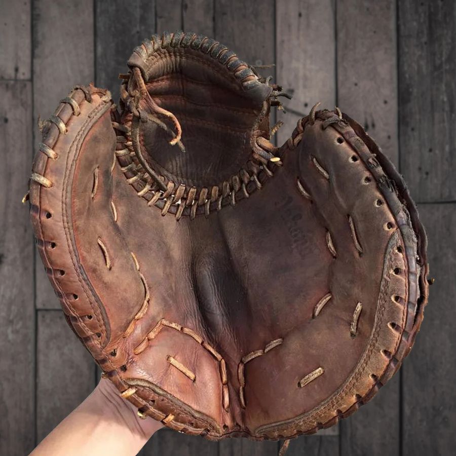A vintage catcher's mitt mid-restoration